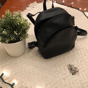Small black backpack purse (with a free surprise!)